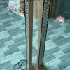 Close angled view of decorative LED column with square base